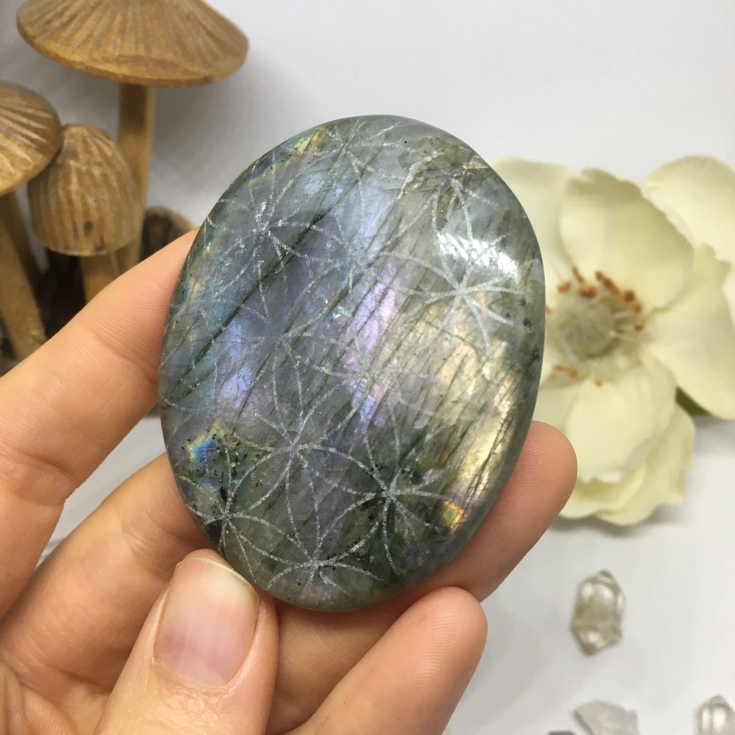 #83 Pastel Pink, gold, and purple Labradorite Palmstone Etched with Flower of Life - Fractalista Designs