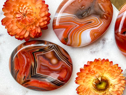 Carnelian Agate Worry Stone Etched with Various Mandalas