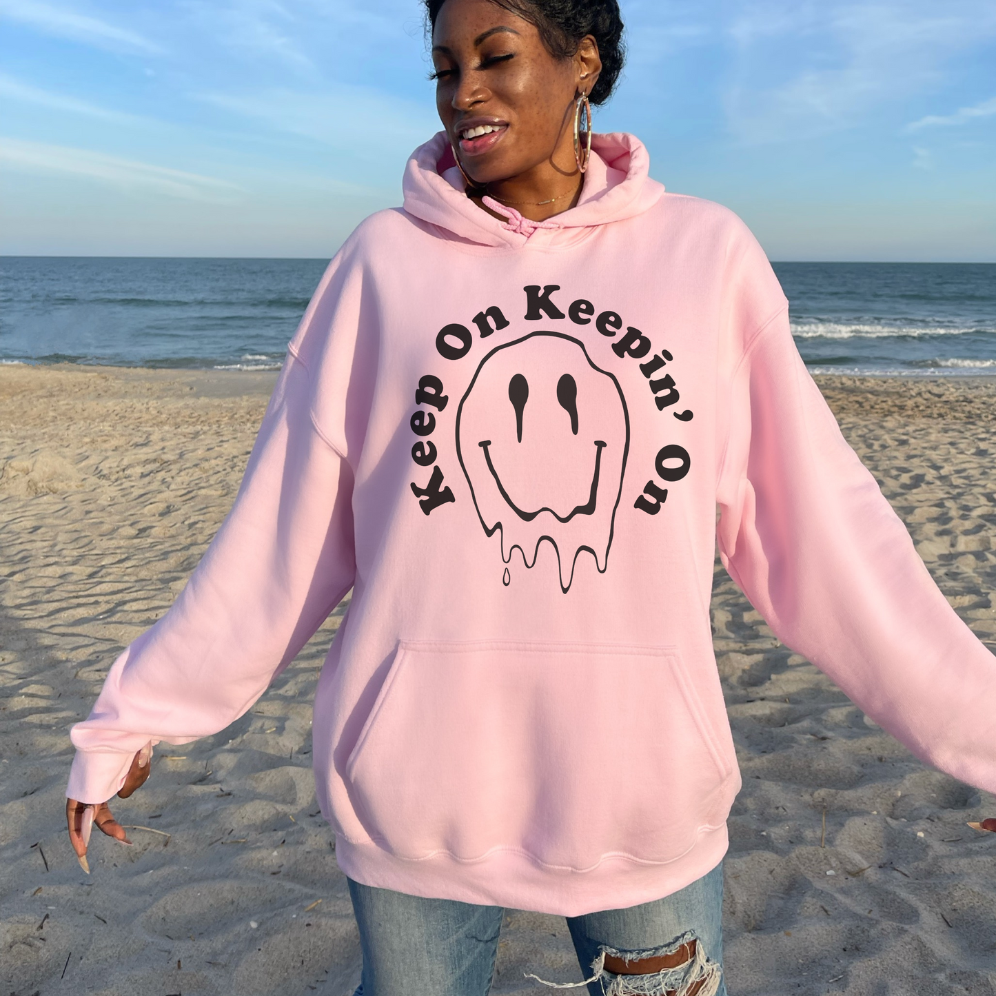 Keep on Keeping on Melting Smiley Face Hoodie