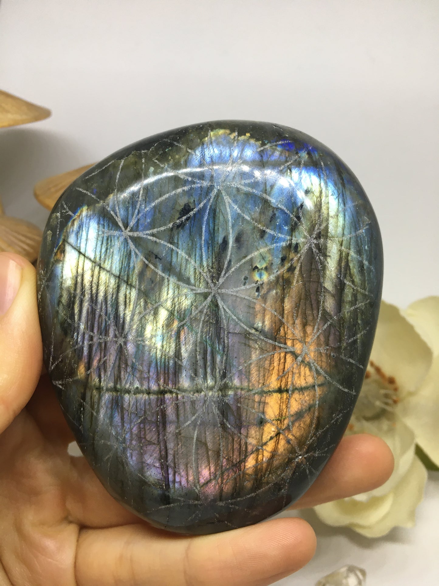 #122 Amazing Rainbow and Purple Flash Labradorite Palmstone Etched with Flower of Life - Fractalista Designs
